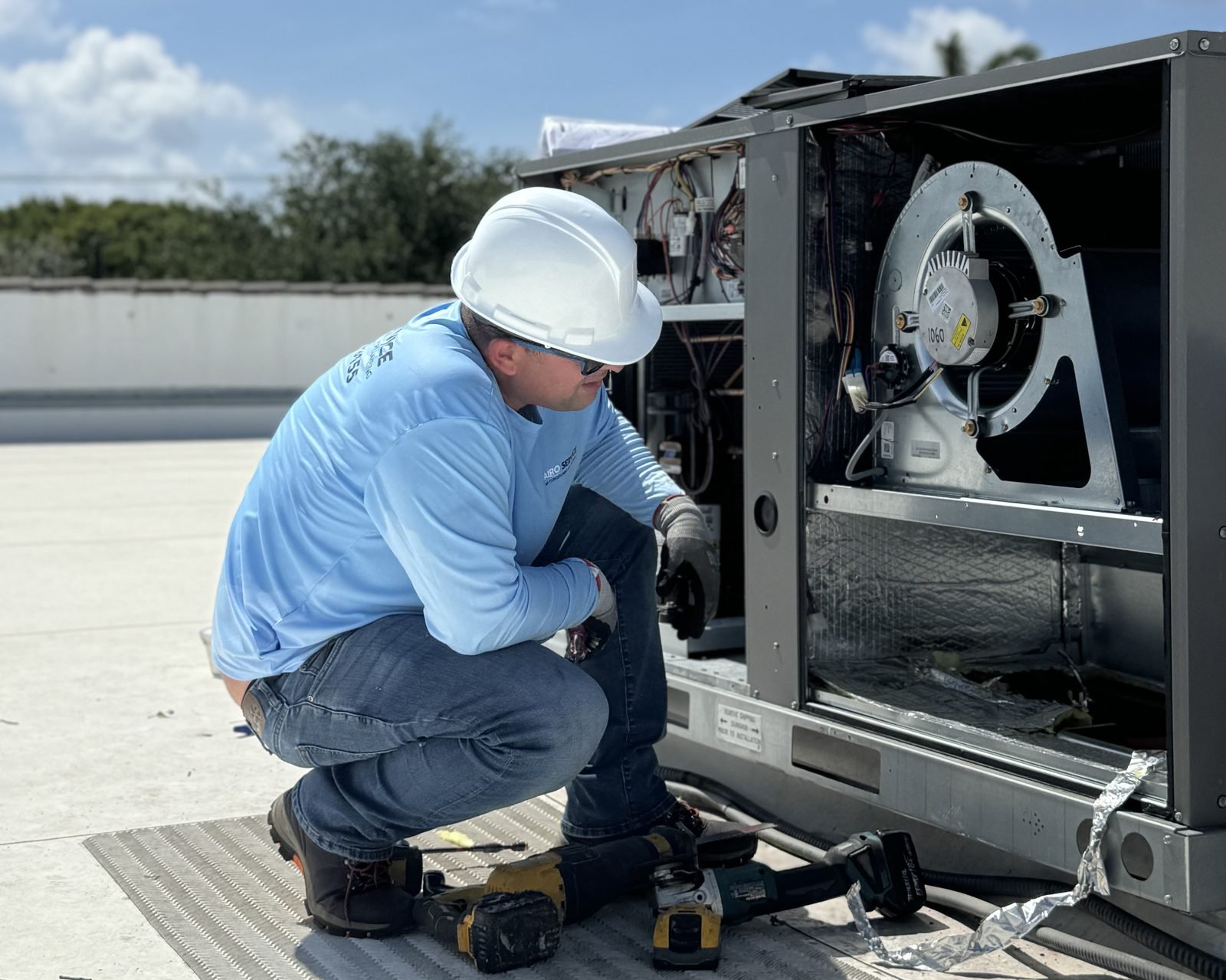 Rooftop packaged units at a South Florida condominium property